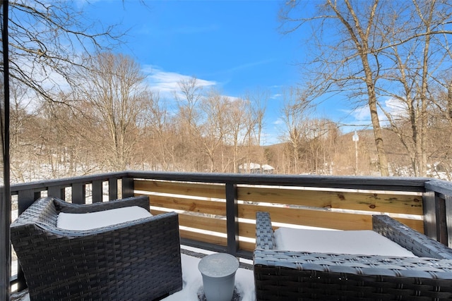 view of snow covered deck