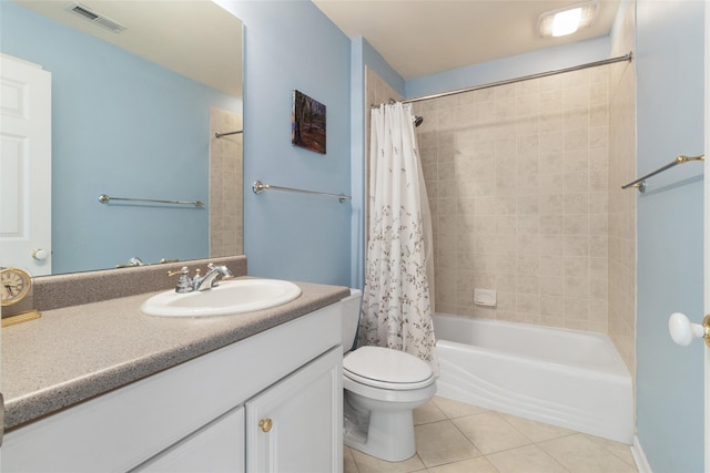 full bath featuring visible vents, toilet, shower / bath combo, vanity, and tile patterned floors