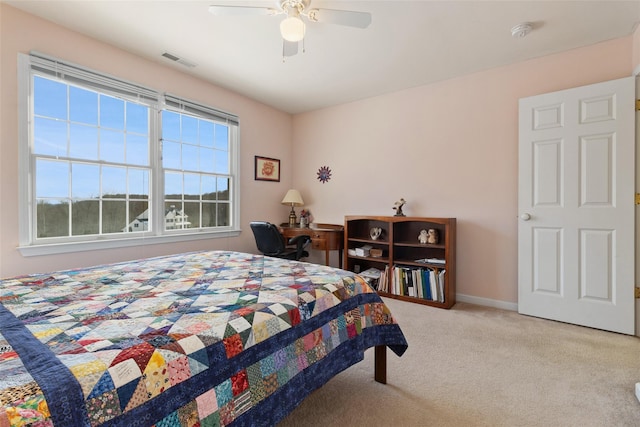 bedroom featuring carpet, ceiling fan, and baseboards
