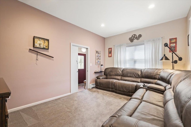 carpeted living area featuring baseboards, baseboard heating, and recessed lighting