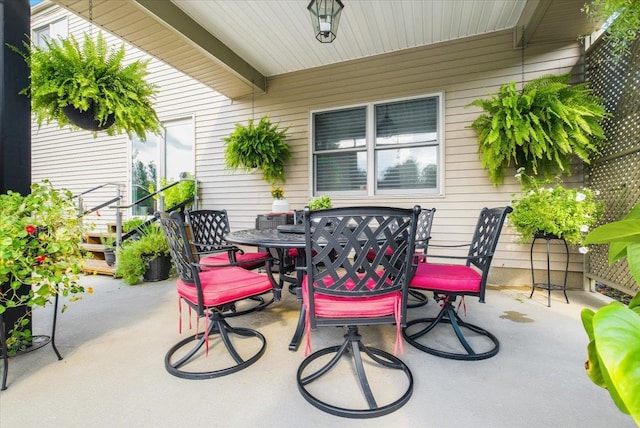 view of patio featuring outdoor dining space