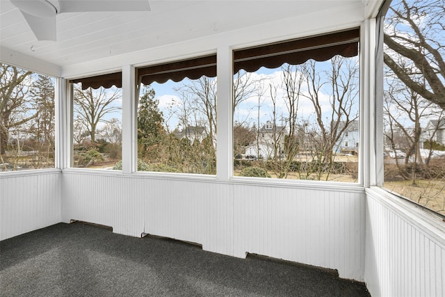 unfurnished sunroom with a healthy amount of sunlight