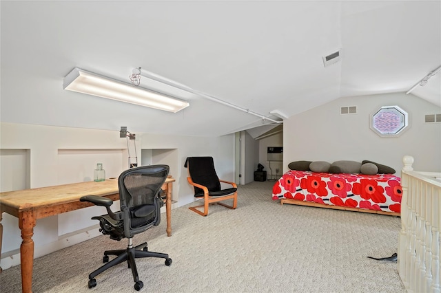 office area featuring carpet and lofted ceiling