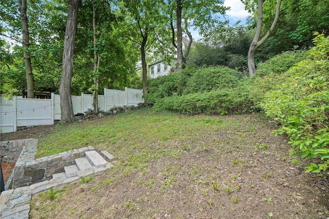 view of yard featuring fence