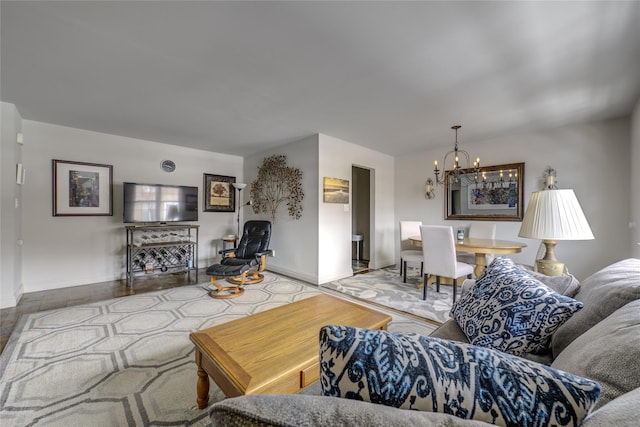 living room with a notable chandelier