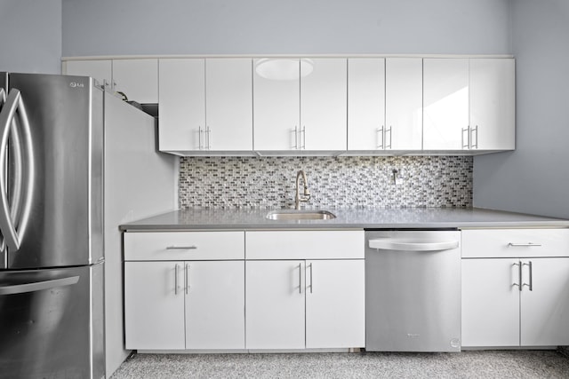 45-08 40th St Unit F32, Sunnyside, NY 11104 - kitchen with a sink, backsplash, white cabinets, and stainless steel appliances