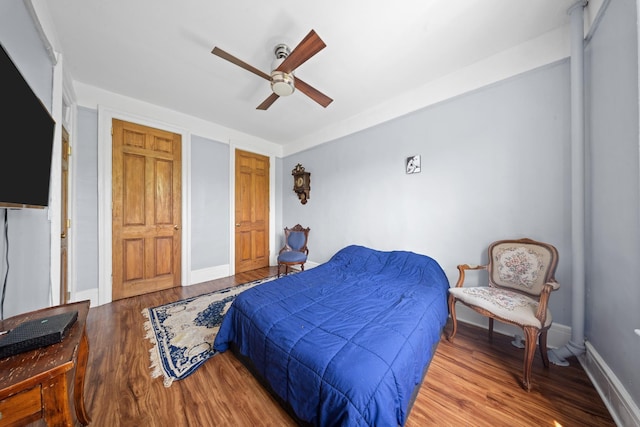 45-08 40th St Unit F32, Sunnyside, NY 11104 - bedroom with baseboards, ceiling fan, and wood finished floors