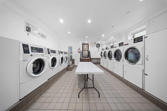 45-08 40th St Unit F32, Sunnyside, NY 11104 - shared laundry area with recessed lighting, independent washer and dryer, and light tile patterned floors