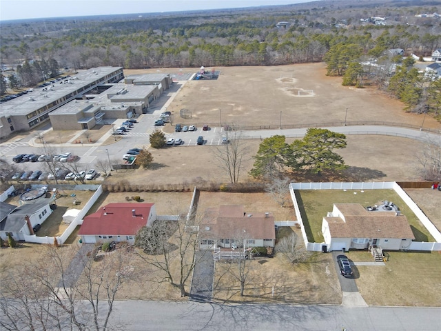 aerial view featuring a wooded view