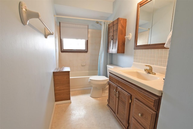 full bath featuring toilet, shower / bath combo with shower curtain, decorative backsplash, and vanity