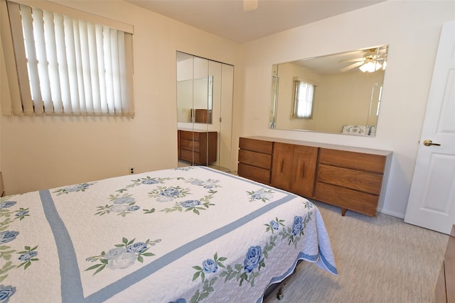 bedroom featuring a closet, carpet flooring, and ceiling fan