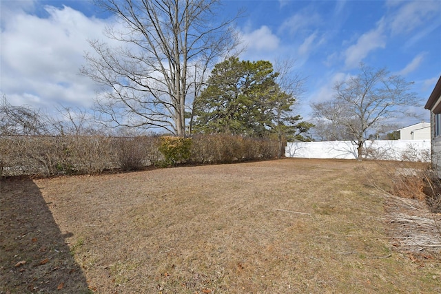 view of yard with fence