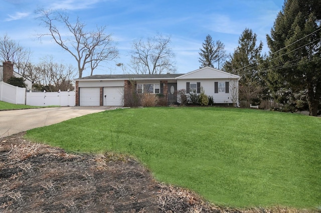 single story home featuring a front yard, concrete driveway, fence, and an attached garage