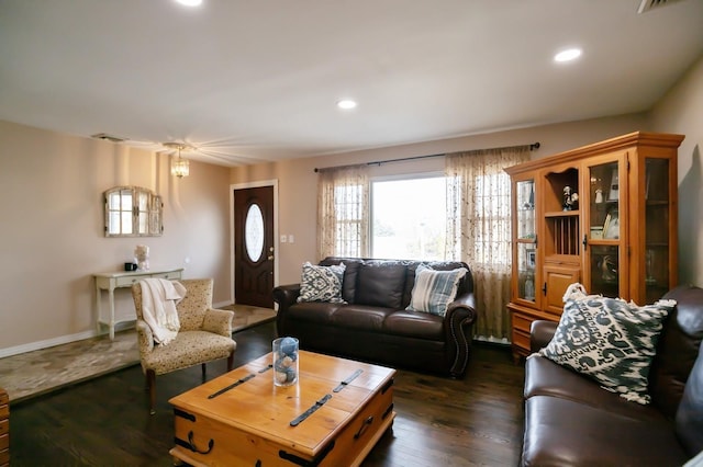 living area featuring dark wood-style floors, baseboards, and recessed lighting