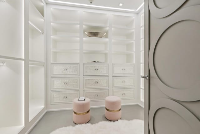 interior space featuring stacked washer and dryer