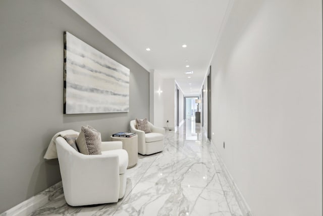 hall with baseboards, marble finish floor, and recessed lighting