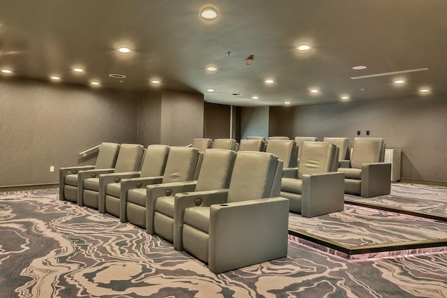 carpeted home theater featuring baseboards and recessed lighting