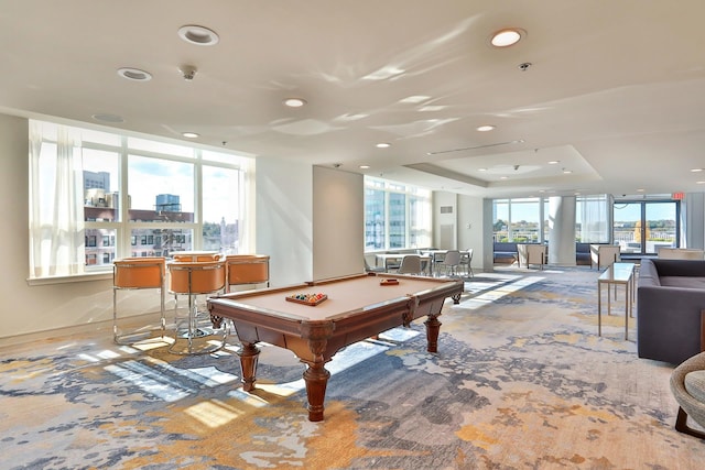 game room featuring plenty of natural light, billiards, a tray ceiling, and recessed lighting