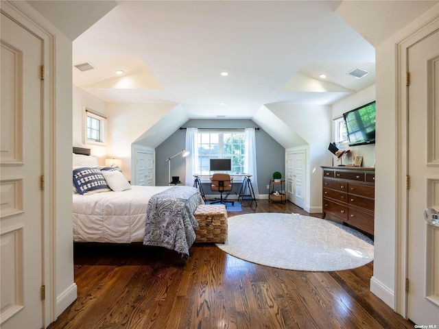 bedroom with visible vents, dark wood finished floors, and recessed lighting