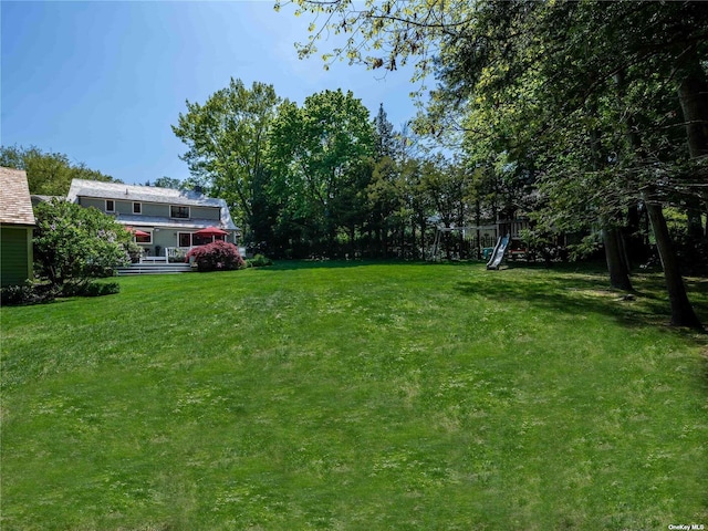 view of yard with a playground