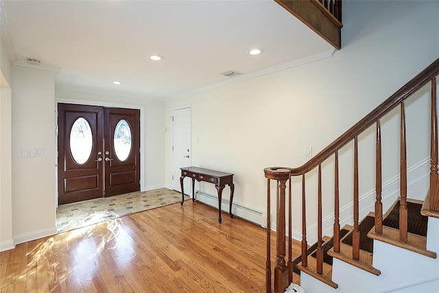 entrance foyer with baseboards, stairway, recessed lighting, wood finished floors, and a baseboard radiator