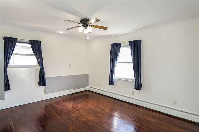 empty room featuring hardwood / wood-style floors, plenty of natural light, baseboard heating, and ceiling fan