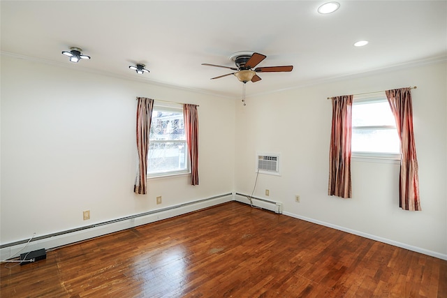 unfurnished room featuring a healthy amount of sunlight, wood finished floors, a ceiling fan, and ornamental molding