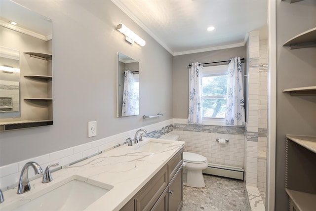 bathroom with a baseboard radiator, a sink, ornamental molding, tile walls, and toilet