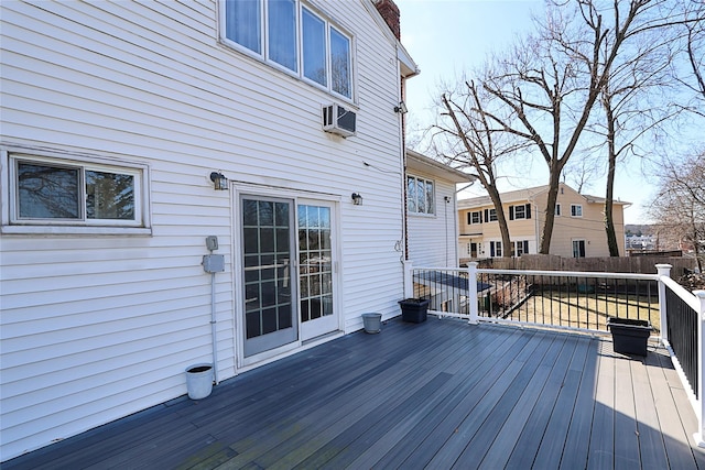 deck featuring an AC wall unit