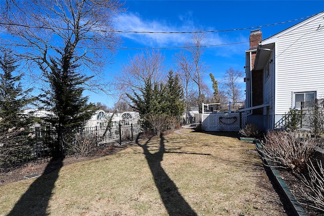 view of yard featuring fence