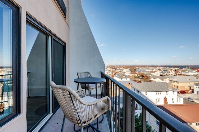 balcony featuring a residential view