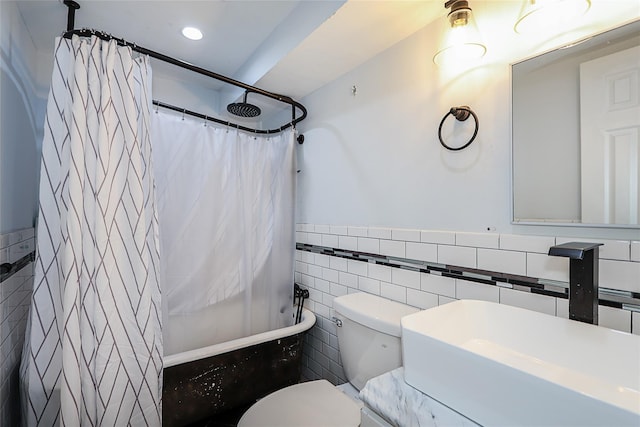 59 Lauren Ave, Dix Hills, NY 11746 - full bath featuring a wainscoted wall, tile walls, and toilet