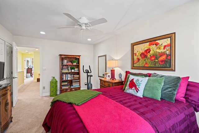 bedroom featuring baseboards, recessed lighting, a ceiling fan, and light colored carpet