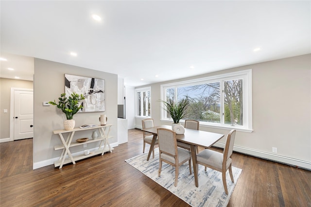 dining space featuring dark wood finished floors, a wealth of natural light, and recessed lighting