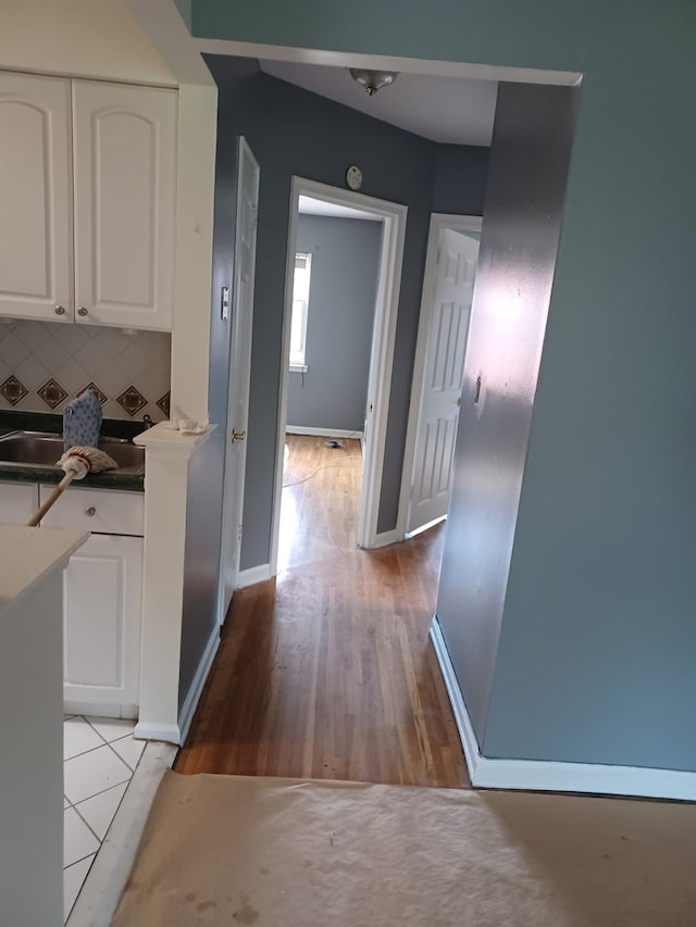 corridor featuring light hardwood / wood-style floors