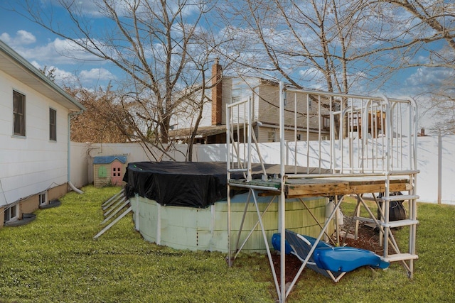 203 Front Ave, Brentwood, NY 11717 - view of yard featuring a fenced backyard and a pool