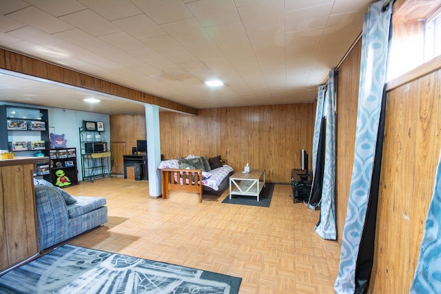 203 Front Ave, Brentwood, NY 11717 - living area featuring wood walls