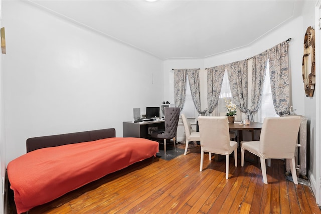 bedroom featuring wood-type flooring