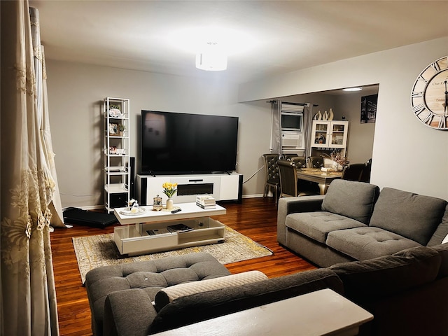 living room with dark hardwood / wood-style floors