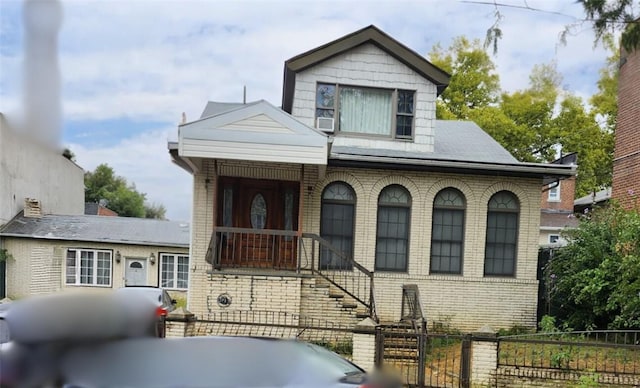 view of front facade with cooling unit