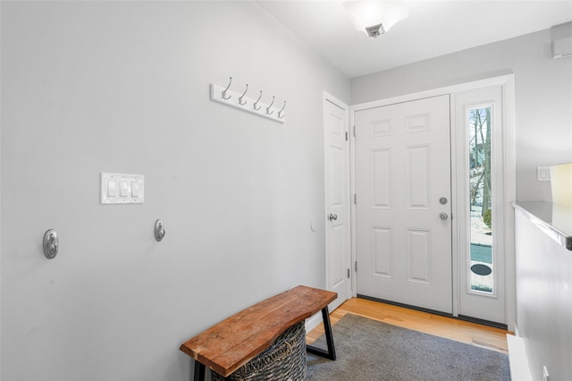 foyer entrance with light wood-style floors