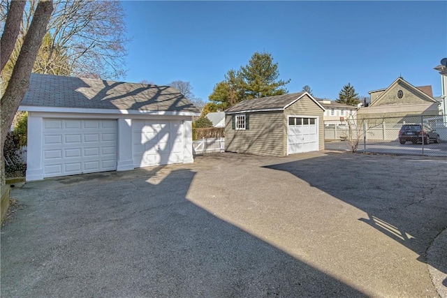 detached garage with fence