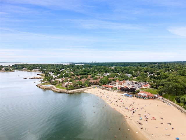 birds eye view of property featuring a water view and a view of the beach