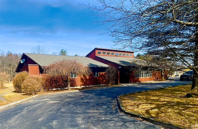 view of building exterior featuring driveway