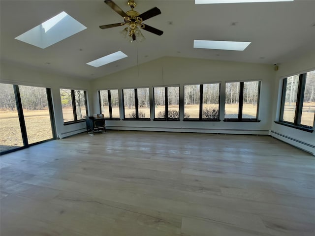 unfurnished sunroom with lofted ceiling and baseboard heating