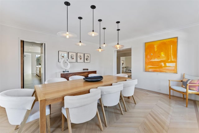 dining area with crown molding