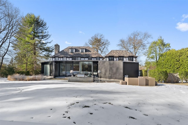 view of front of property with a chimney