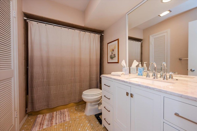 full bath with curtained shower, tile patterned flooring, vanity, and toilet