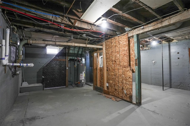 basement featuring water heater