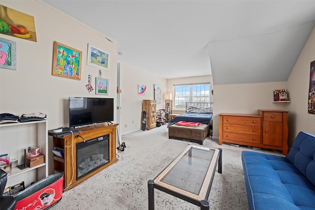 living area with light colored carpet and baseboards